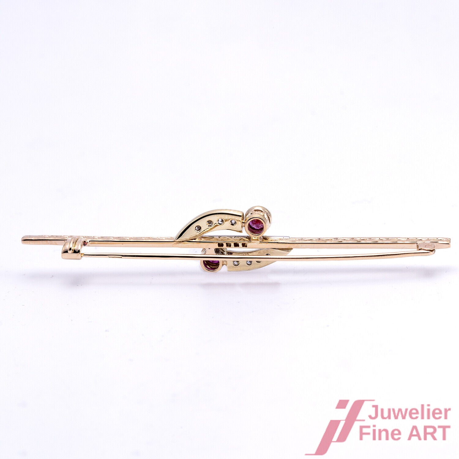 Brosche - 14K/585 Gelbgold - Diamanten ca. 0,30 ct W/P + 2 Rubine ca. 0,50 ct