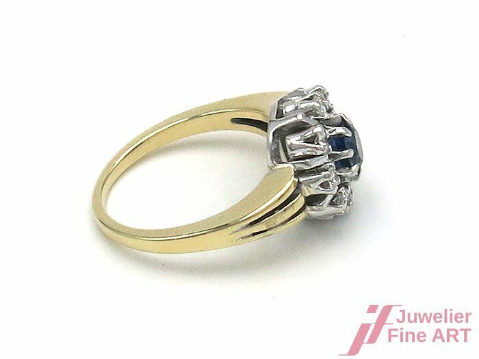 Ring 14K/585 GG/WG - 1 Saphir 0,60 ct + 8 Brill. 0,40 ct /W/si - 7,2 g - Gr. 56