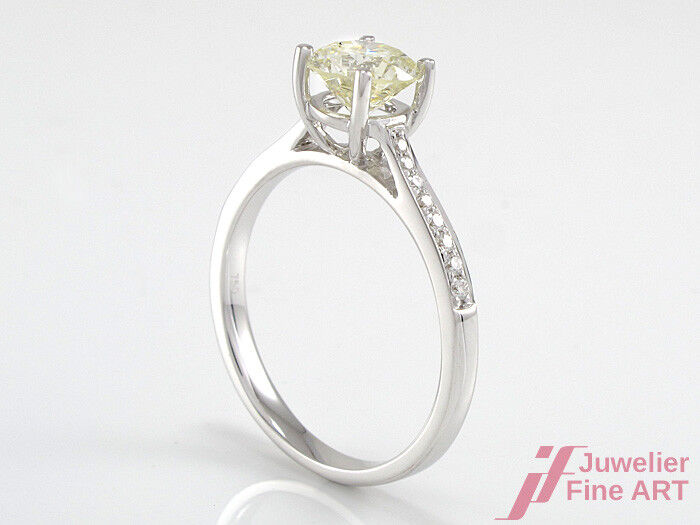 Diamant-Solitärring mit Akzentsetzung - 0,96 ct P-R/VSI 18K WG - 2,8 g - Gr. 52