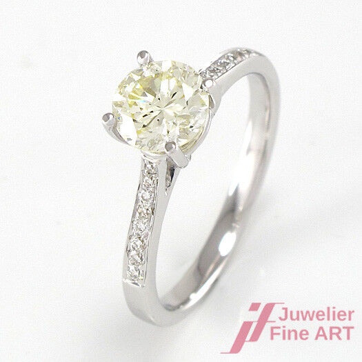 Diamant-Solitärring mit Akzentsetzung - 0,96 ct P-R/VSI 18K WG - 2,8 g - Gr. 52