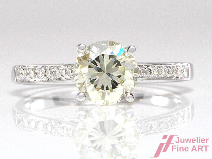 Diamant-Solitärring mit Akzentsetzung - 0,96 ct P-R/VSI 18K WG - 2,8 g - Gr. 52